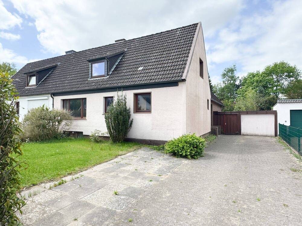 Thumbnail-Doppelhaushälfte in ruhiger Lage von Moorrege mit flexibler Raumaufteilung und Garten