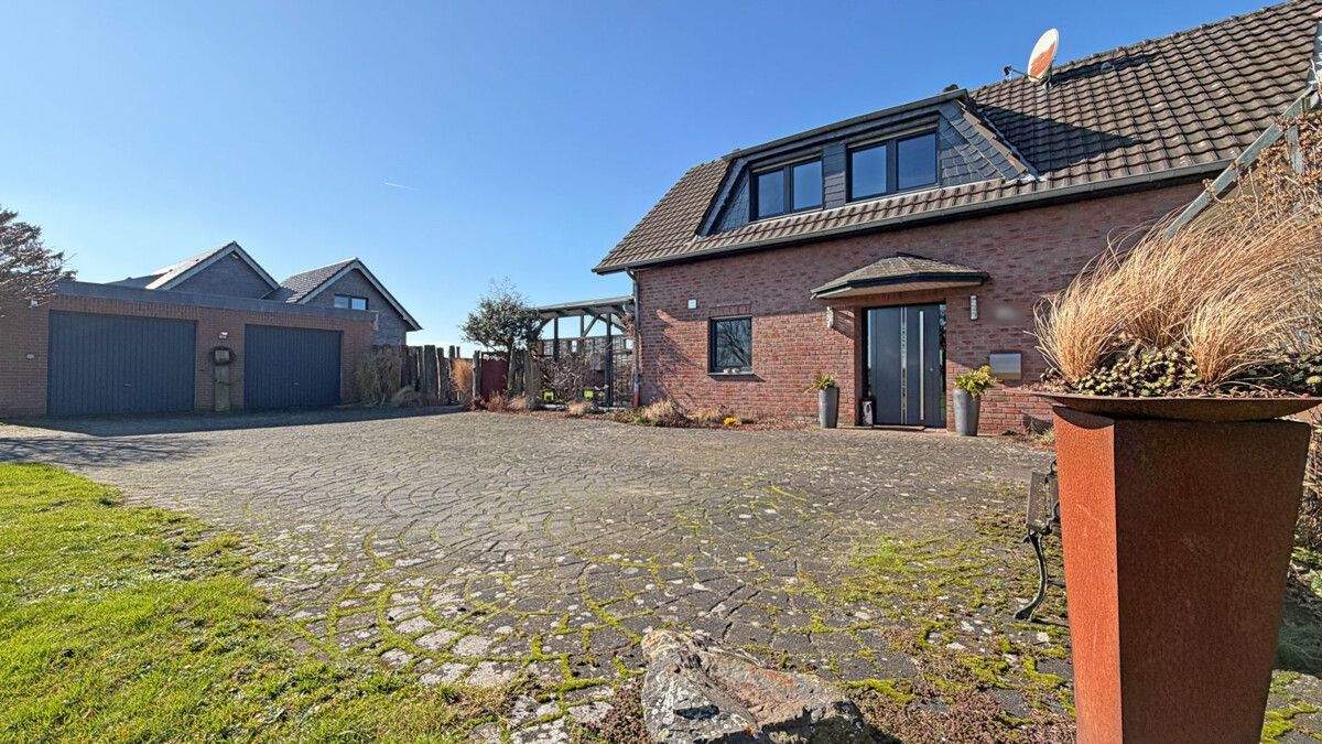 Thumbnail-Praktisch wohnen zwischen Feldern und Wiesen - Haushälfte mit großem Grundstück!