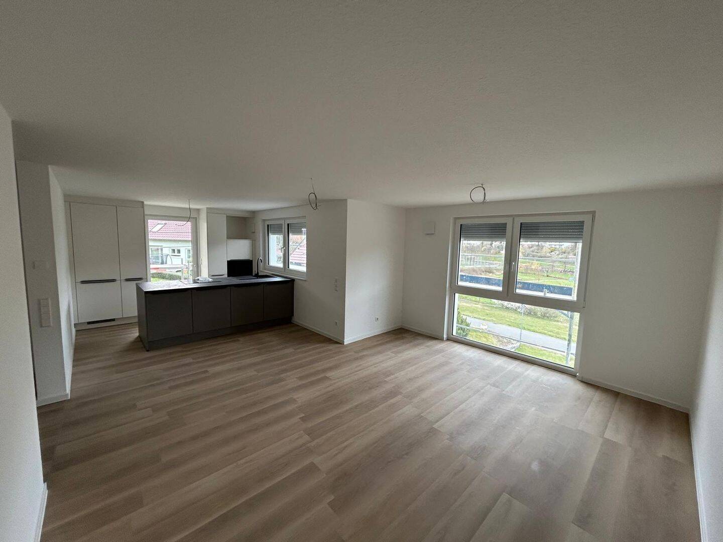 Thumbnail-Erstbezug in Kupprichhausen: Moderne, helle 3-Zimmer-Wohnung mit Balkon und Ausblick ins Grüne