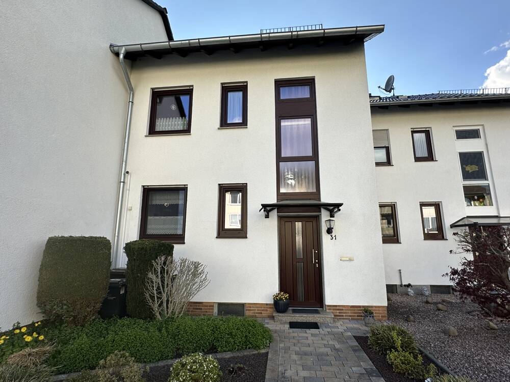 Thumbnail-Familienfreundliches Reihenhaus mit Ausbaureserve & Garage in ruhiger Lage von Baunatal-Großenritte