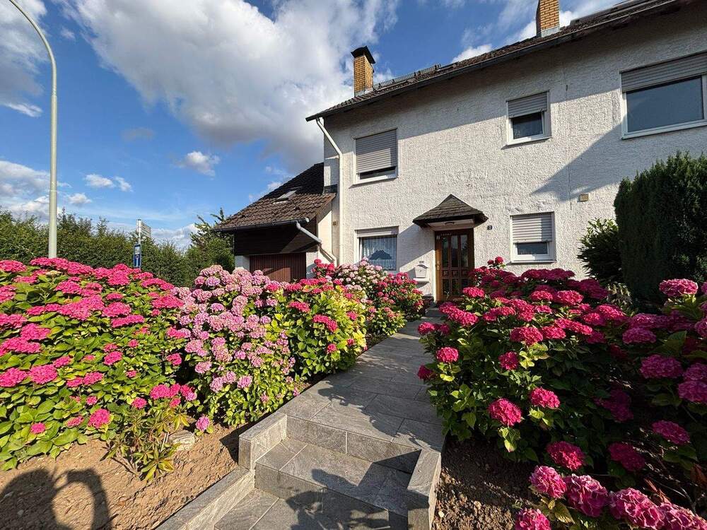 Thumbnail-Ruhiges Familienparadies - Charmantes Reihenendhaus in Rosbach mit Garten & Garage