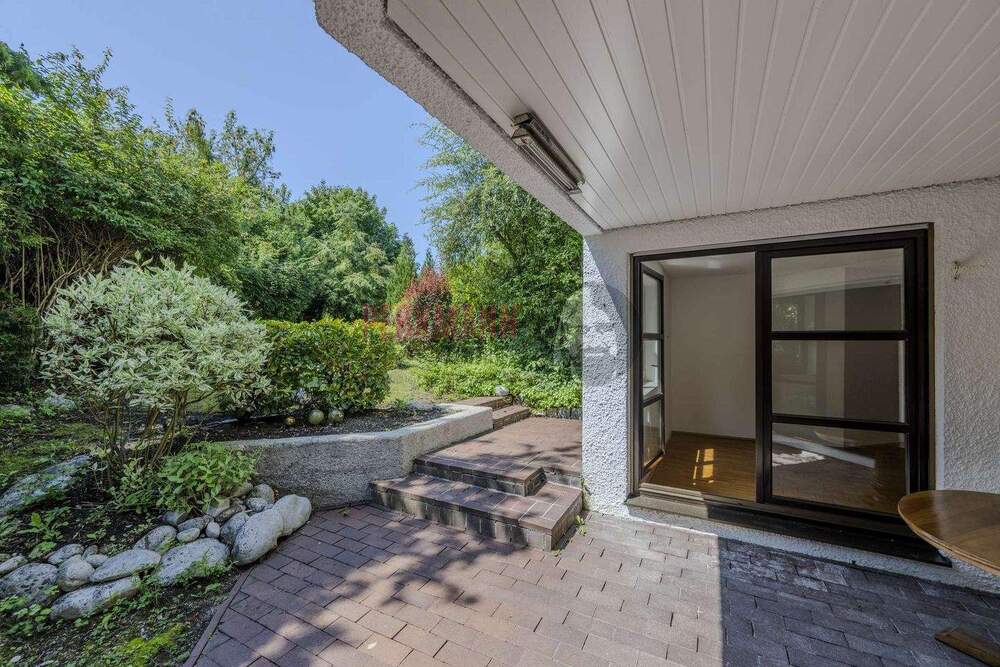 Thumbnail-3 Zimmer Split-Level Gartenwohnung mit Hobbyraum + Sauna und Tiefgaragenstellplatz in ruhiger Lage