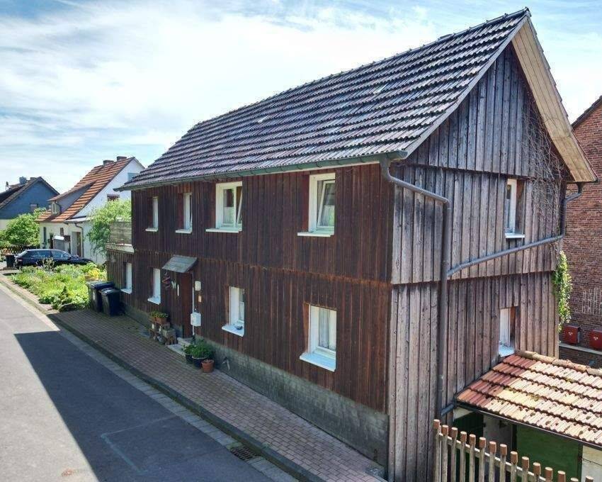 Thumbnail-kleines Fachwerkhaus mit massivem Anbau, kleinem, gemütlichen Garten und PKW-Stellplatz in ruhiger Ortsrandlage