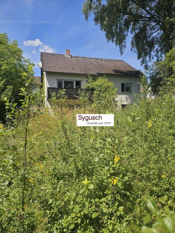 Thumbnail-2-3 Familienhaus in idyllischer Lage mit grossem Gartengrundstück