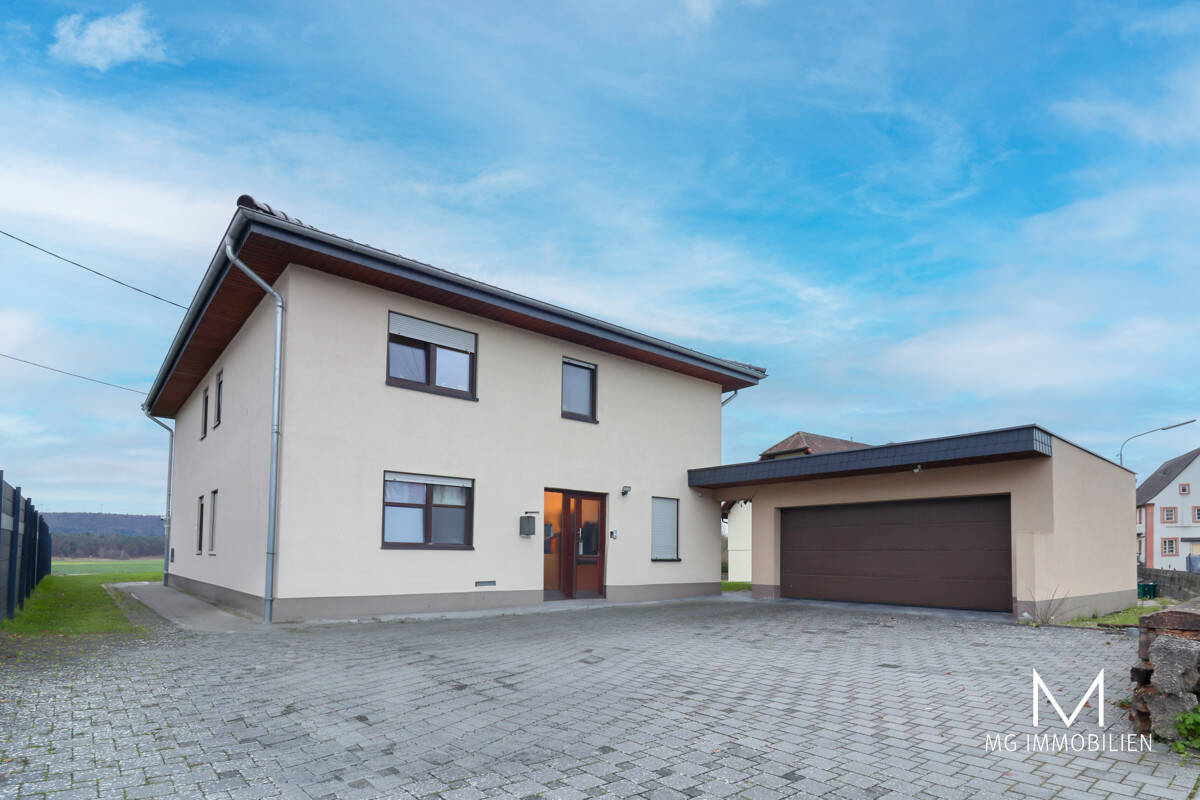 Thumbnail-MG - Vermietetes Einfamilienhaus mit Garten und Garage in Spesbach
