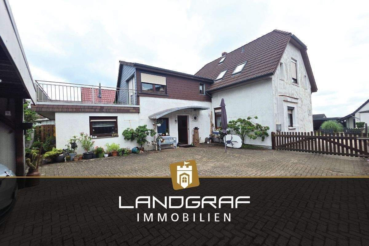Thumbnail-Mehr als nur ein Einfamilienhaus – Großes Grundstück mit Extra-Gartenhaus & vielseitigen Nutzungsmöglichkeiten!