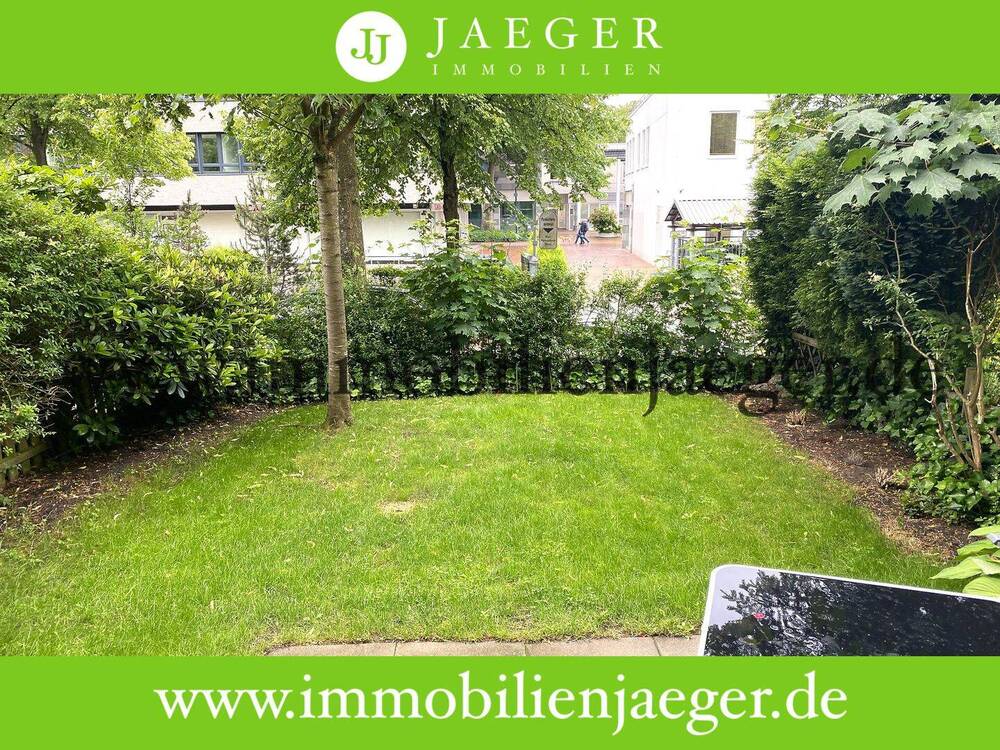 Thumbnail-Charmante Erdgeschosswohnung mit Terrasse und Gartenanteil - Wohnbereich mit offener Einbauküche