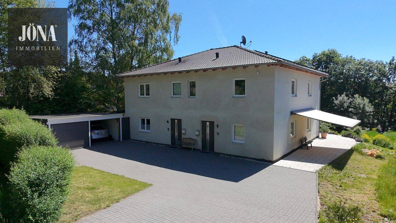 Thumbnail-KfW-55-Einfamilienhaus mit Einliegerwohnung und großzügigem Grundstück