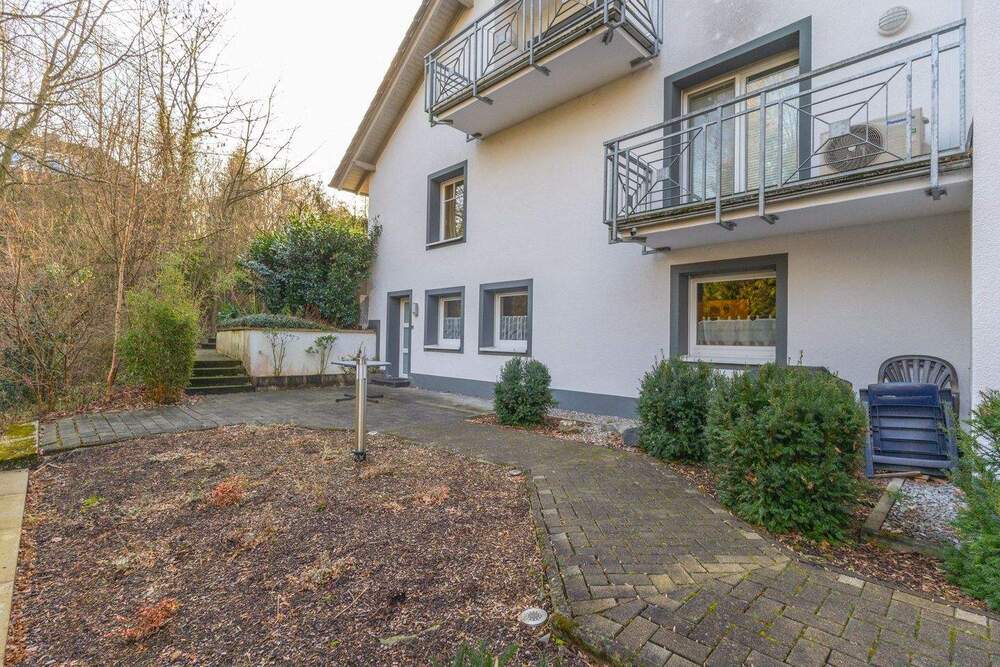 Thumbnail-Menden Platte Heide – ETW im UG mit sep. Hauseingang, Terrasse, Garten & Carport