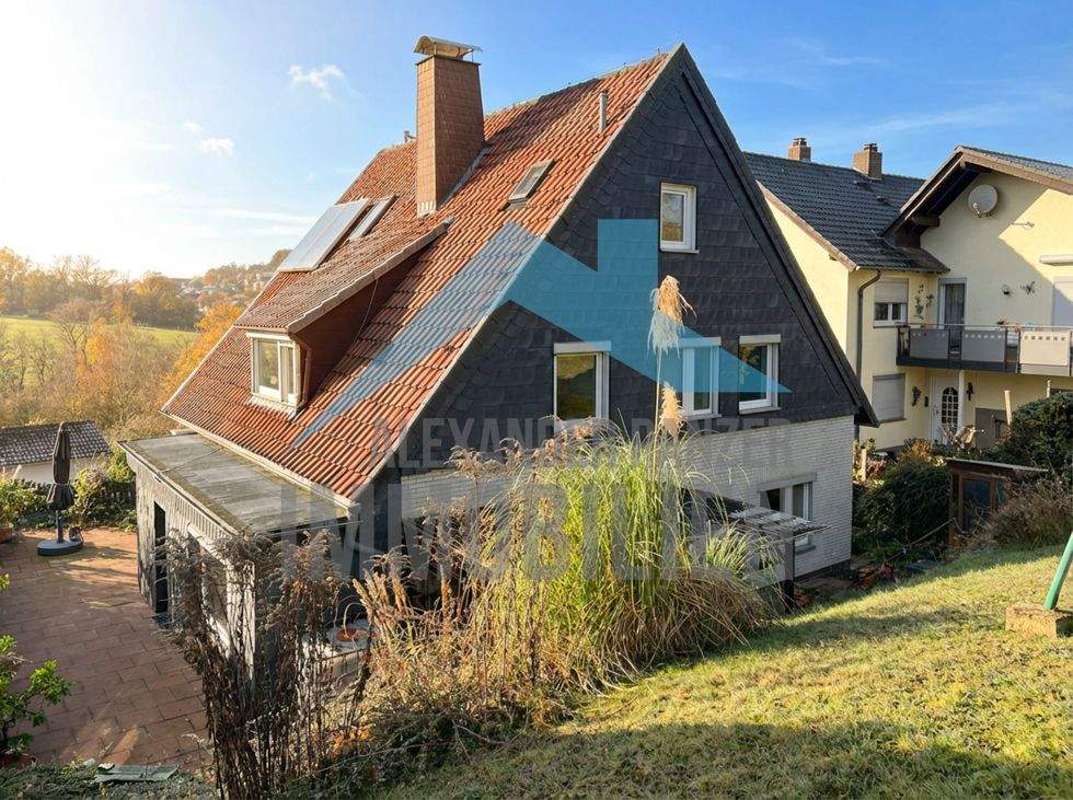 Thumbnail-Freistehendes Einfamilienhaus mit Einliegerwohnung in ruhiger Lage von Edermünde-Grifte!