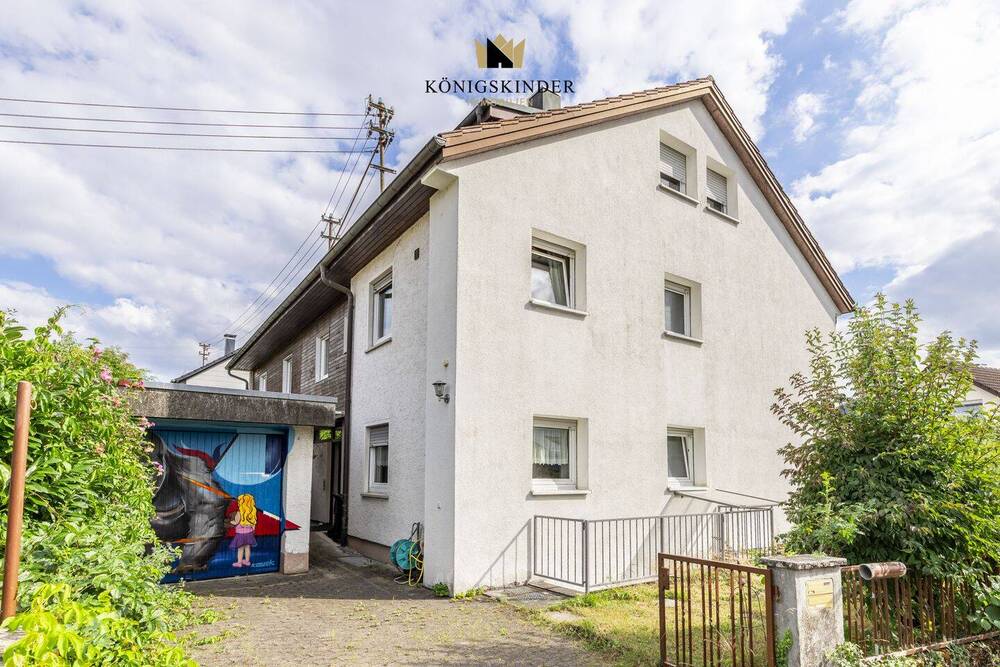 Thumbnail-Platz genug für 2 Generationen - Geräumige Doppelhaushälfte mit kleinem Garten und Garage!