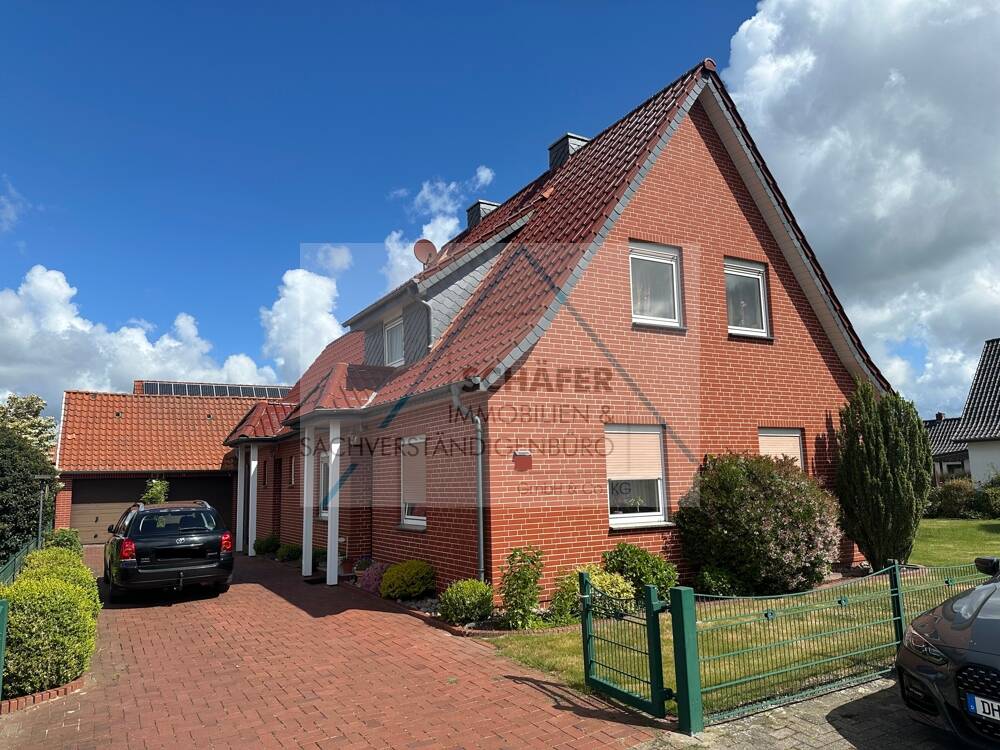 Thumbnail-Freistehendes Einfamilienhaus mit Einliegerwohnung zu verkaufen