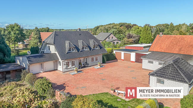 Thumbnail-Familienfreundliches Einfamilienhaus mit separater Gewerbefläche in Jaderberg (Obj.-Nr. 6536)