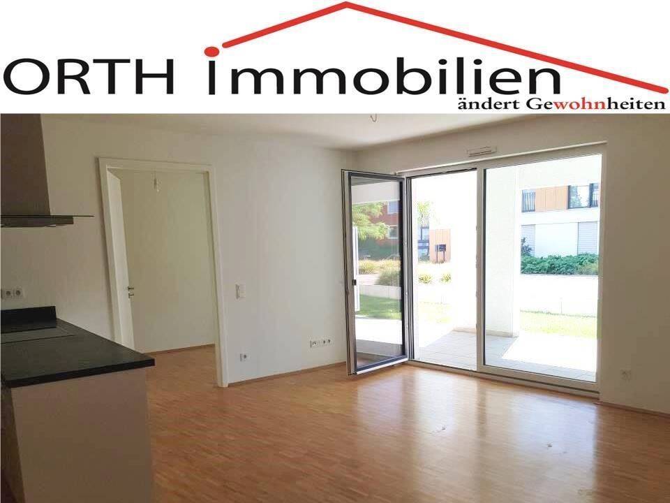 Thumbnail-3 Zimmer EG mit Einbauküche, Sonnenterrasse + Zugang zum Gartenbereich.