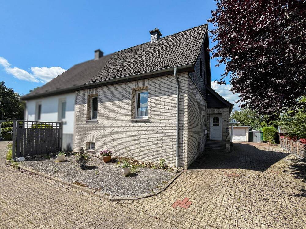 Thumbnail-Doppelhaushälfte mit Charme, Potenzial und großem Garten in Lengerich