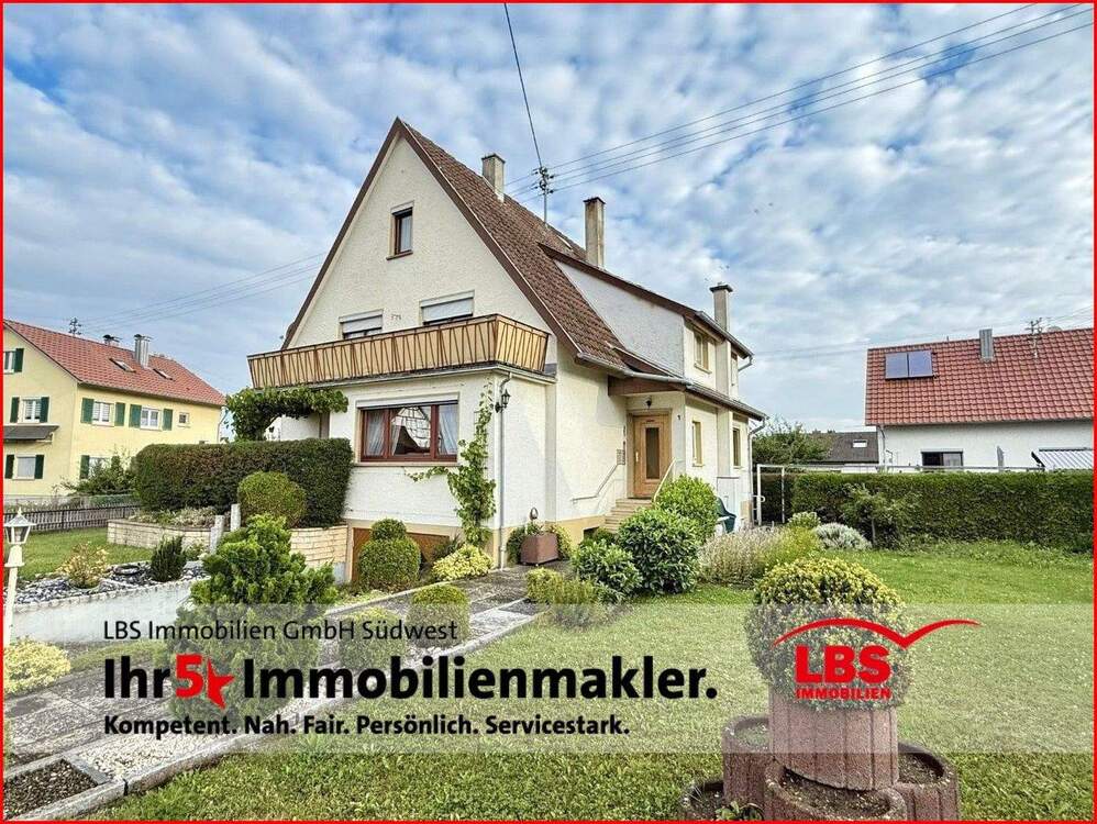 Thumbnail-Einfamilienhaus mit ELW, Nahwärmeheizung und 2 Garagen in guter Lage