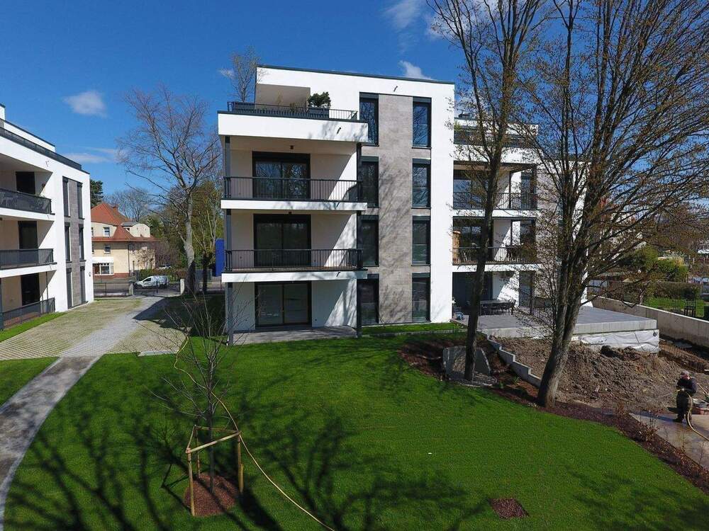 Thumbnail-NEUBAU mit 5-Zimmern BLICK in den AUENWALD 70m² WOHNEN 2 x TERRASSEN KAMIN 2 x TG-SP ca. 7.000m² eingezäunter Gemeinschaftsgarten