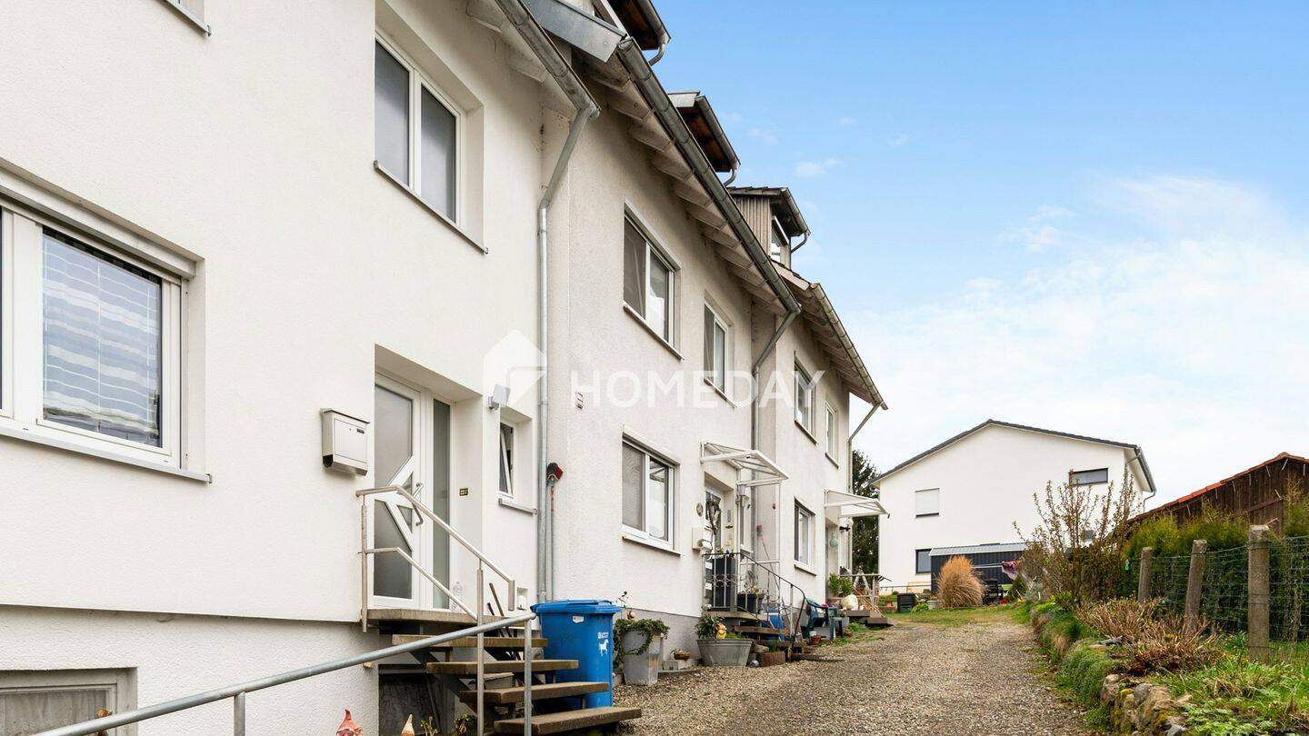 Thumbnail-Vielseitiges Reihenmittelhaus mit Einliegerwohnung, Kamin und sonnigem Garten