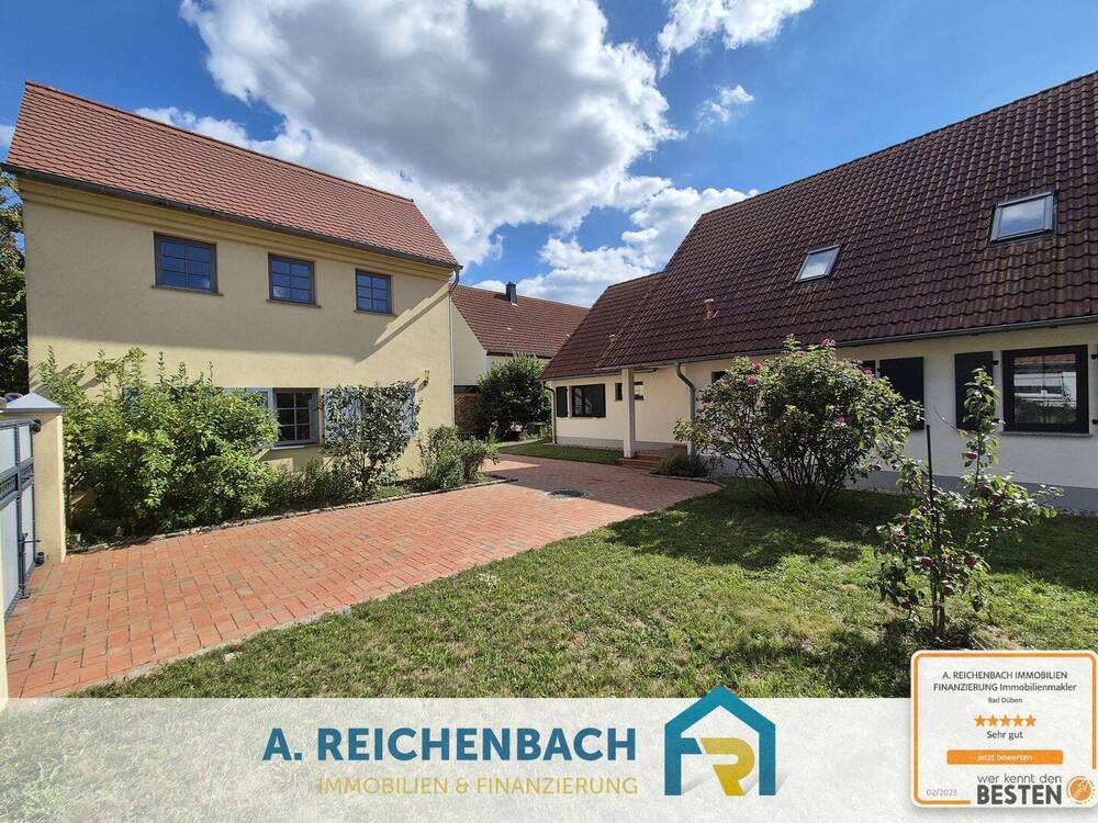 Zwei Häuser auf einem Grundstück