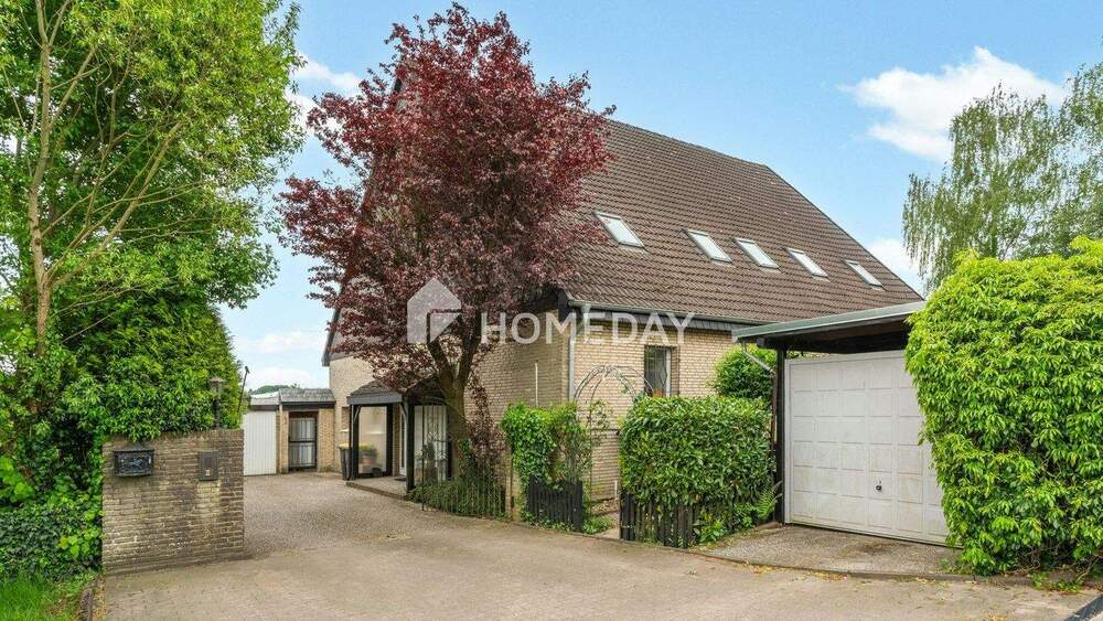 Thumbnail-Großzügige Erdgeschosswohnung mit Gartenidylle und Komfort im Zweifamilienhaus
