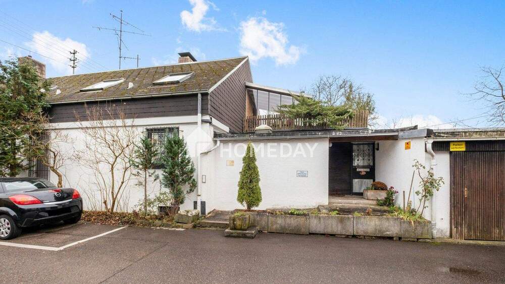 Thumbnail-Großzügiges Einfamilienhaus mit Einliegerwohnung und gut vermieteter Gewerbeeinheit!