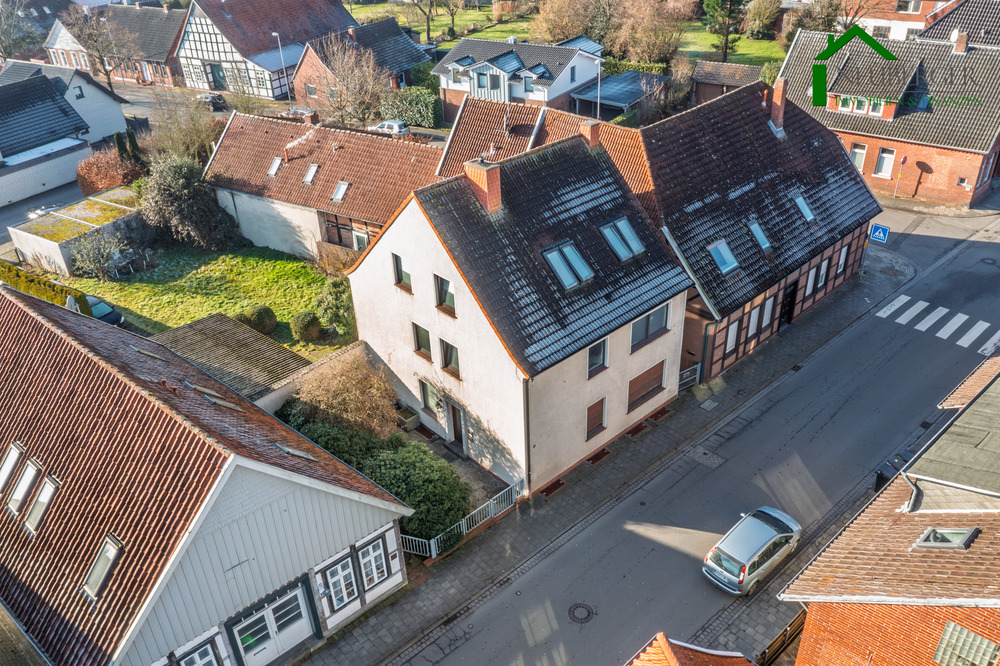 Thumbnail-Solides Mehrfamilienhaus mit 3 Wohneinheiten, 4 Garagen und Entwicklungspotenzial