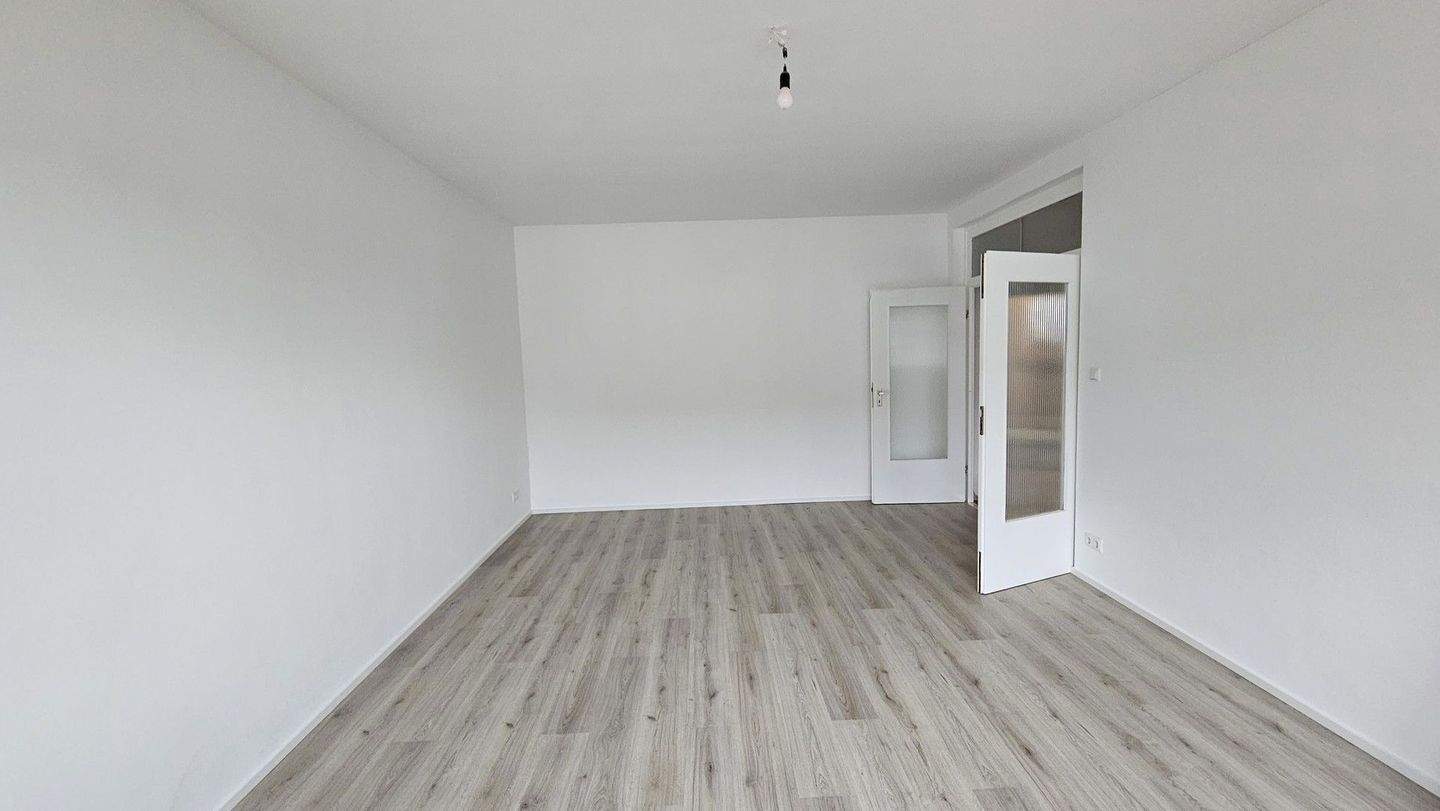 Thumbnail-Frisch sanierte, sonnige 2-Zimmer-Wohnung mit Süd-Loggia & TG-Stellplatz - ruhig & zentral