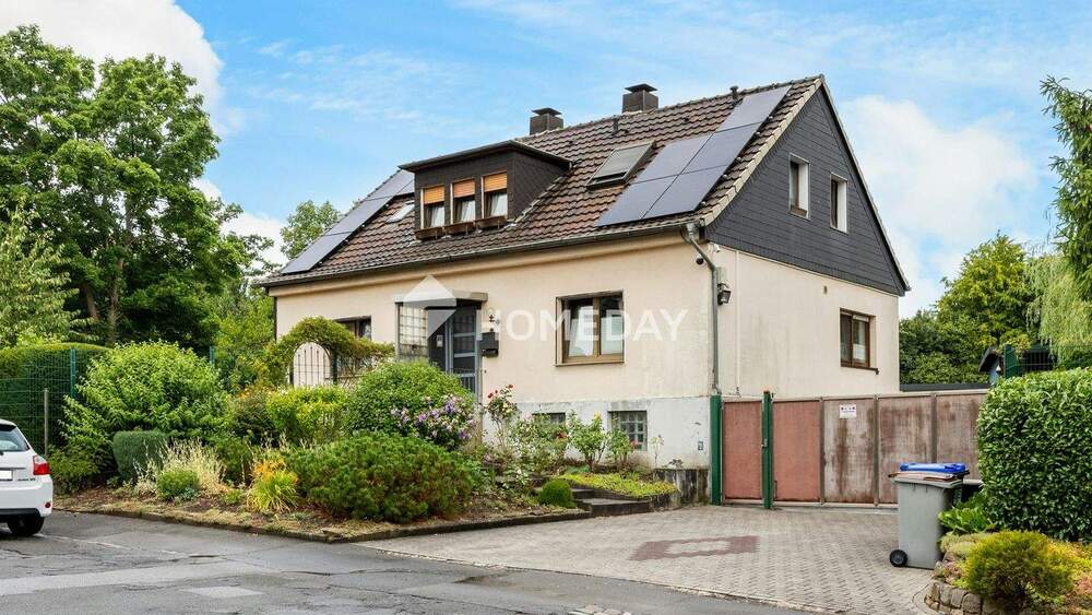 Thumbnail-Einfamilienhaus mit Einliegerwohnung, großem Grundstück und vielseitigen Nutzungsmöglichkeiten