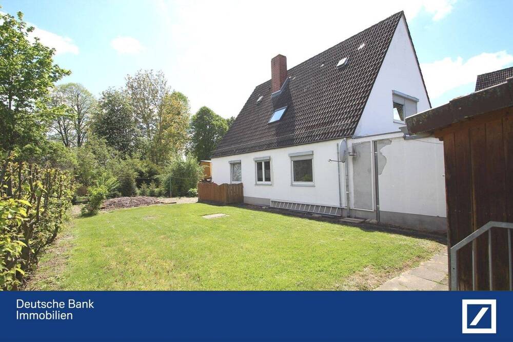 Thumbnail-Drei Wohnungen und große Lagerhalle mit schönem Garten und Garage!