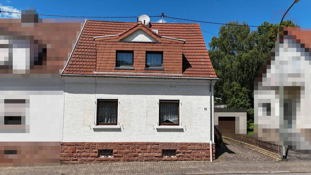 Thumbnail-Doppelhaushälfte mit großem Garten und Garage in Merzig - ideal für Familien