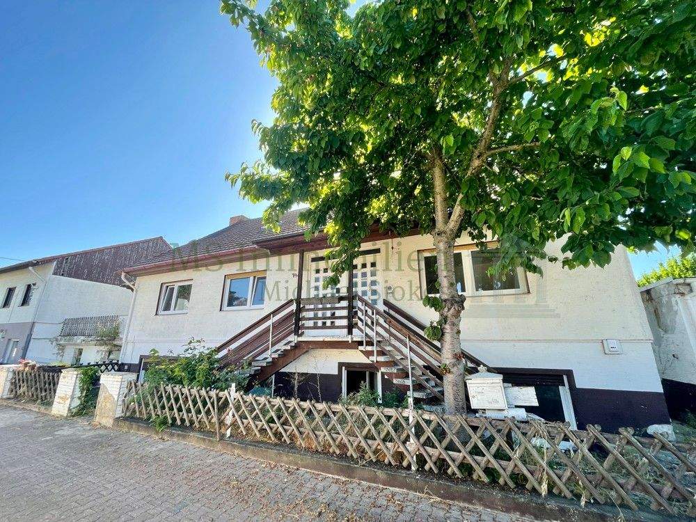 Thumbnail-Mehrfamilienhaus in Hamm am Rhein mit großem Potenzial für ein 4-5 Familienhaus