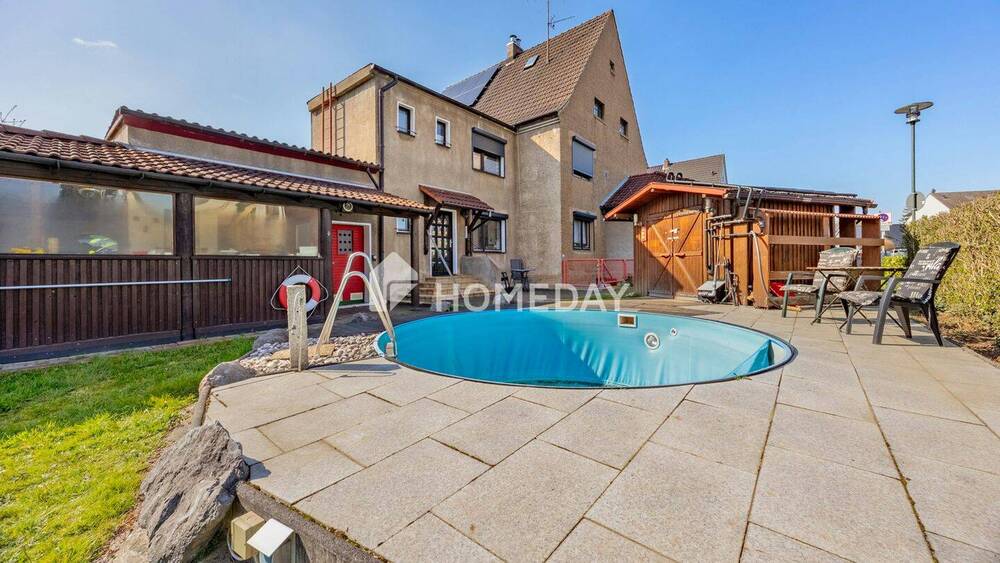 Thumbnail-Charmante Doppelhaushälfte mit Einliegerwohnung, großem Garten & vielseitigen Nutzungsmöglichkeiten