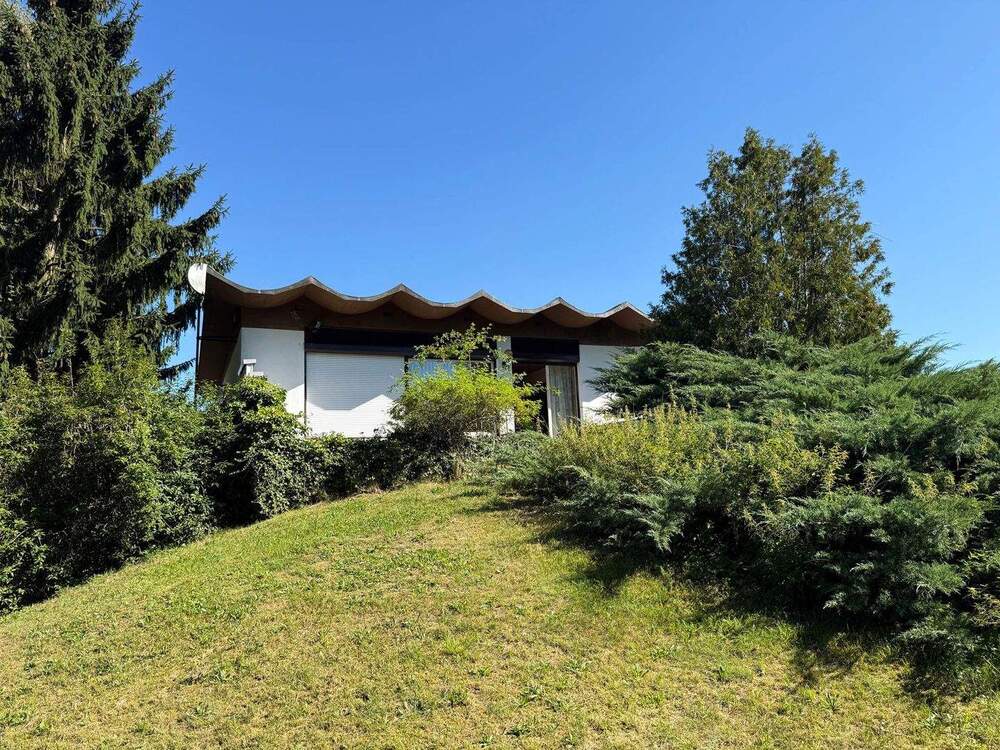 Thumbnail-Freistehendes Einfamilienhaus mit weitläufigem Garten und Erweiterungspotenzial