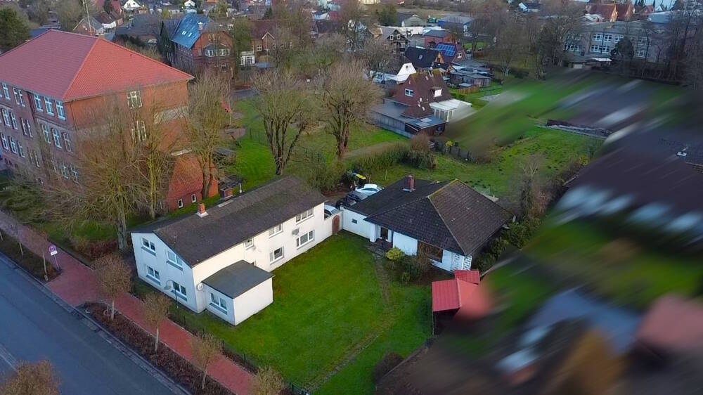 Thumbnail-Attraktives Immobilienensemble: Mehrfamilienhaus mit separatem Bungalow im Herzen von Lunden
