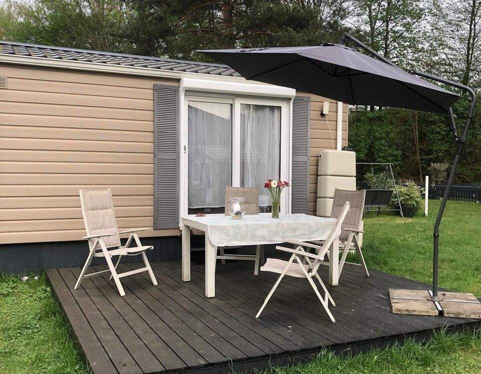 Thumbnail-Wohnqualität auf kleinem Raum-Mobilheim mit Terrasse & Garten
