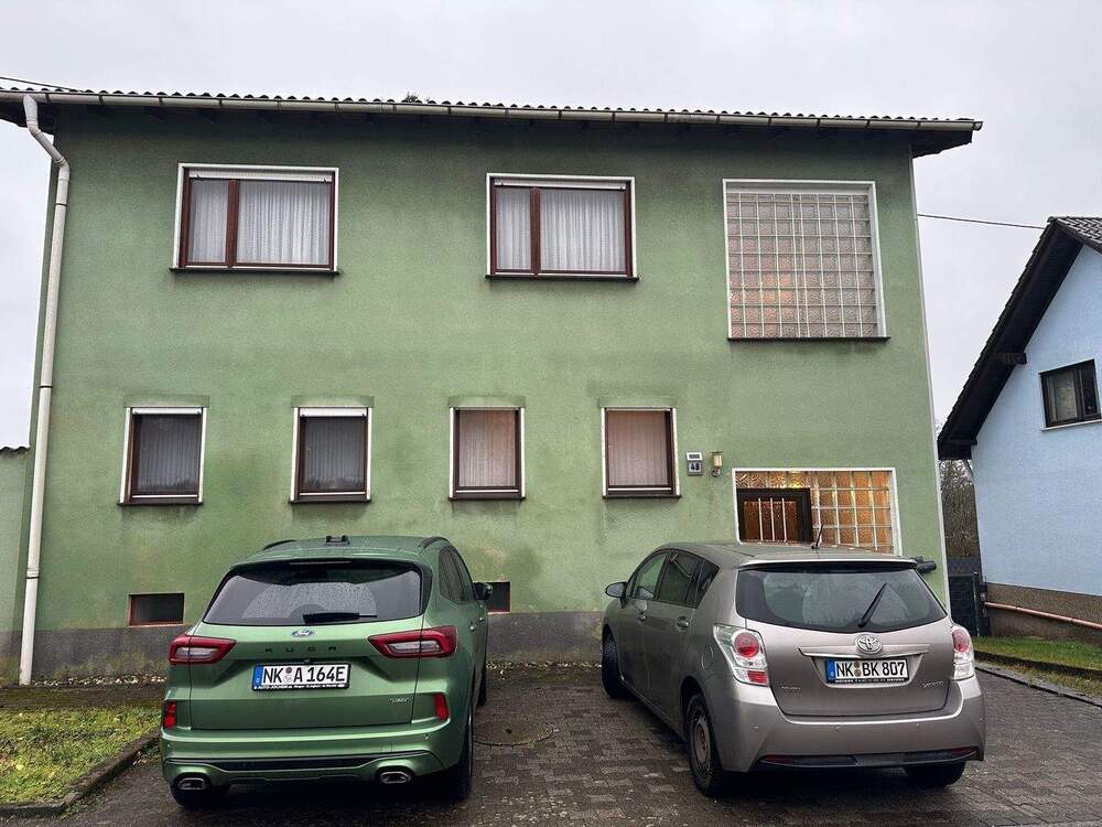 Thumbnail-Wannemacher Immobilien **** Geräumiges Einfamilienhaus mit viel Potential mit zwei Wohneinheiten in Heiligenwald ****