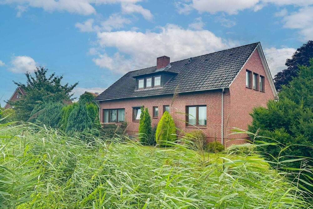 Thumbnail-Gestaltbares Zuhause in Jork: EFH mit Südwest-Garten, Garagen und Sanierungsbedarf