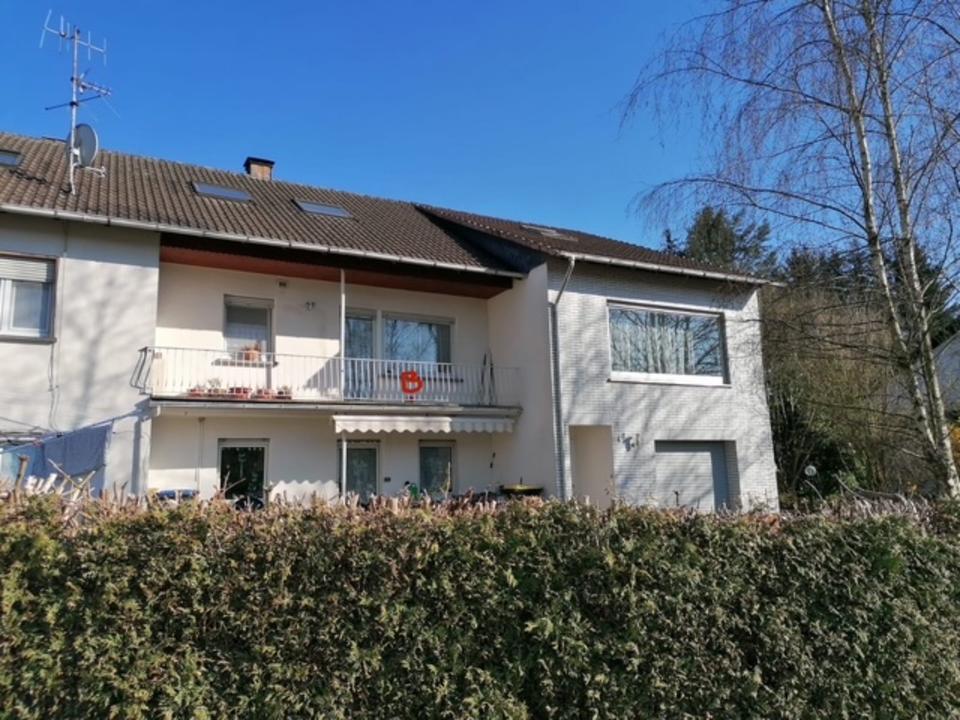 Thumbnail-Erdgeschosswohnung mit Doppelgarage, eigenesGrundstück, vermietet