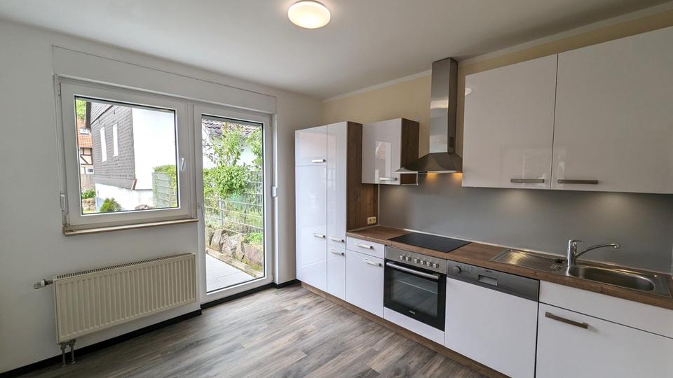 Thumbnail-Helle, moderne 3‑Zimmer‑Wohnung mit großer Terrasse im EG mit EBK