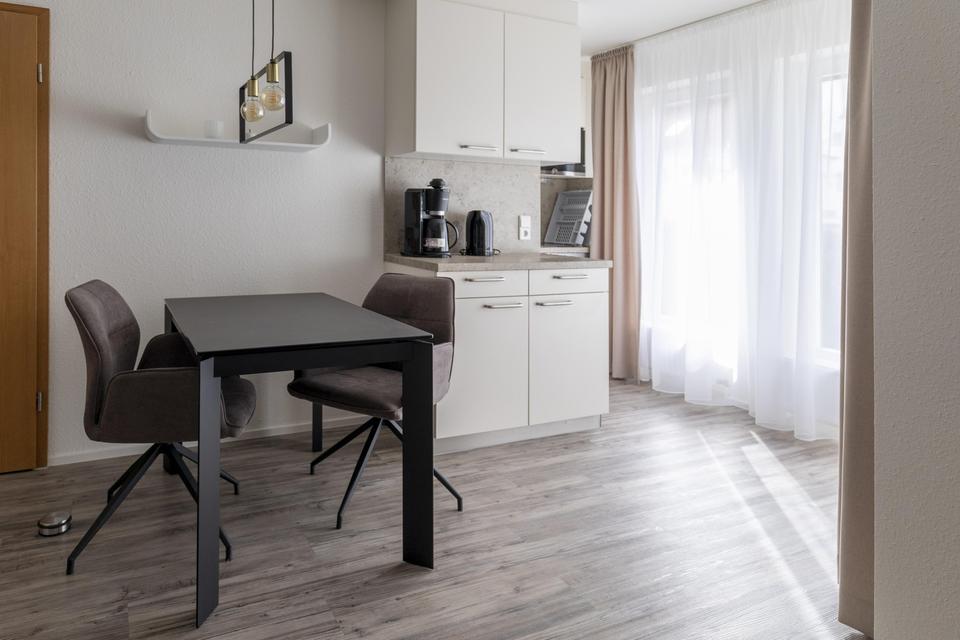 Thumbnail-Gemütliche, voll möblierte 1-Zimmer-Wohnung in ruhiger Lage mit Parkplatz