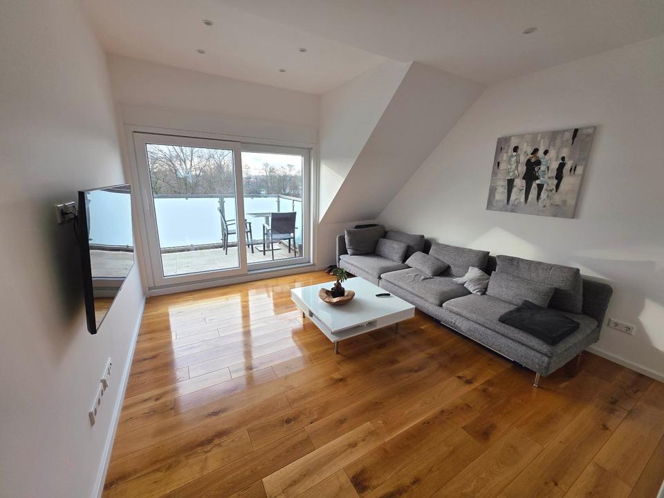 Thumbnail-Top moderne vollmöblierte DG-Wohnung mit direktem Parkblick