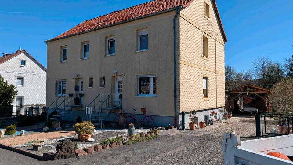Thumbnail-Solide Doppelhaushälfte mit großzügigem Grundstück,Garage Tambach