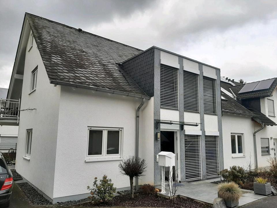 Thumbnail-Eigentumswohnung mit Garten und Garagen