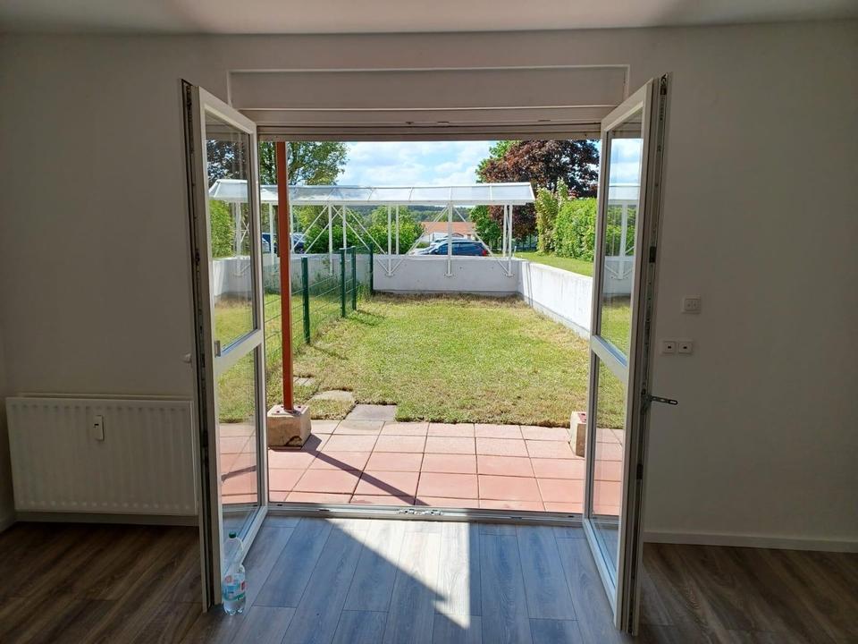 Thumbnail-Helle 2 Zimmer Wohnung mit EBK, eigenem Garten mit Terrasse und Westausrichtung