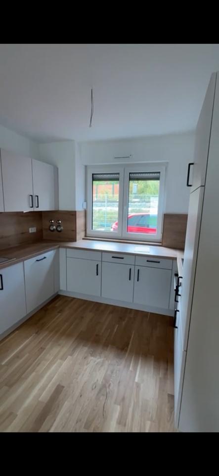 Thumbnail-Neubauwohnung mit Terasse und Garten