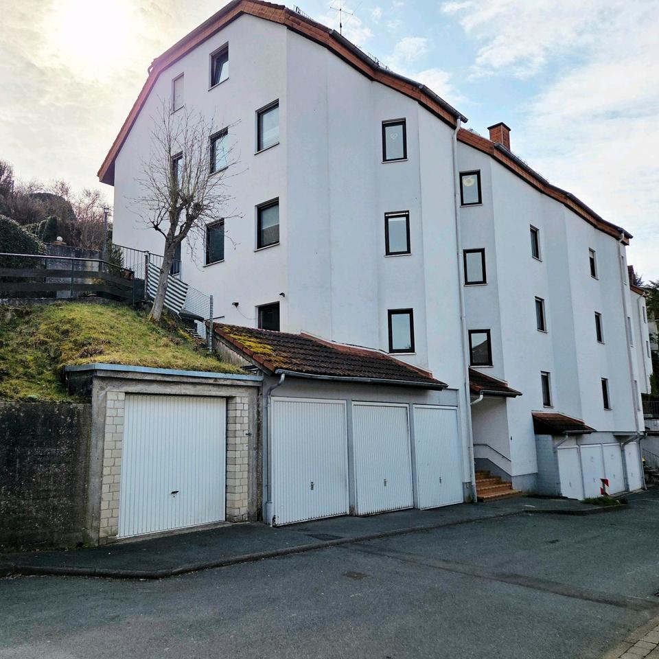 Thumbnail-Eigentumswohnung mit Garten und Garage