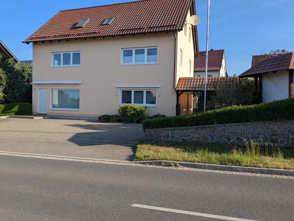 Thumbnail-Einfamilienhaus mit Gewerbeeinheit und Carport