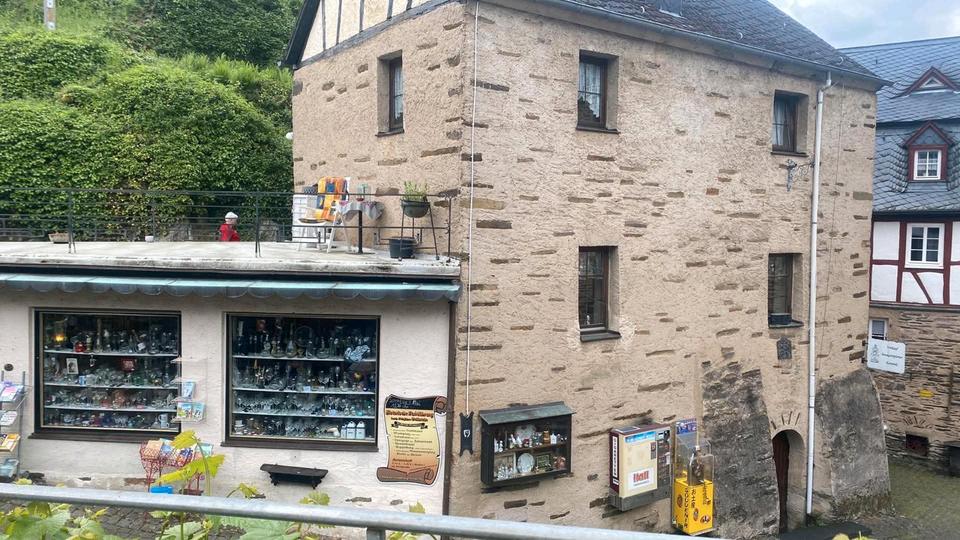 Thumbnail-Ladenlocal mit Haus