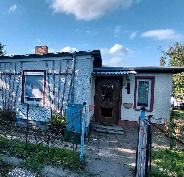 Thumbnail-Doppelhaushälfte mit Ackerland