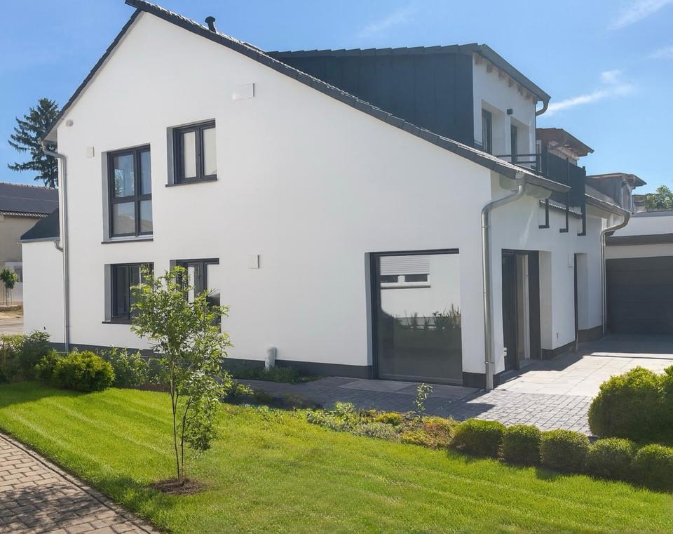 Thumbnail-Neubau mit Garten auf zwei Ebenen – Erstbezug im Effizienzhaus 40